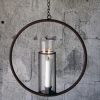 Hängande ljusring med stormglas i rostig metall