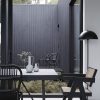 Matbord i svart teak och metall industristil