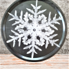 Rund bricka med snöflinga