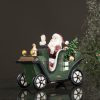 Tomte med grön bil julpynt