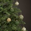 Julgranskulor i grönt glas med glitter