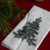 Vit servett med grön julgran
