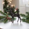 Juldekoration vätte tomte på älg