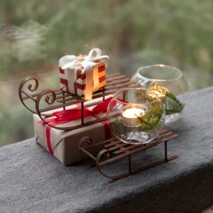 Kälke släde i rostigt järn dekoration