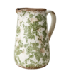 Kanna med grönt blommigt mönster