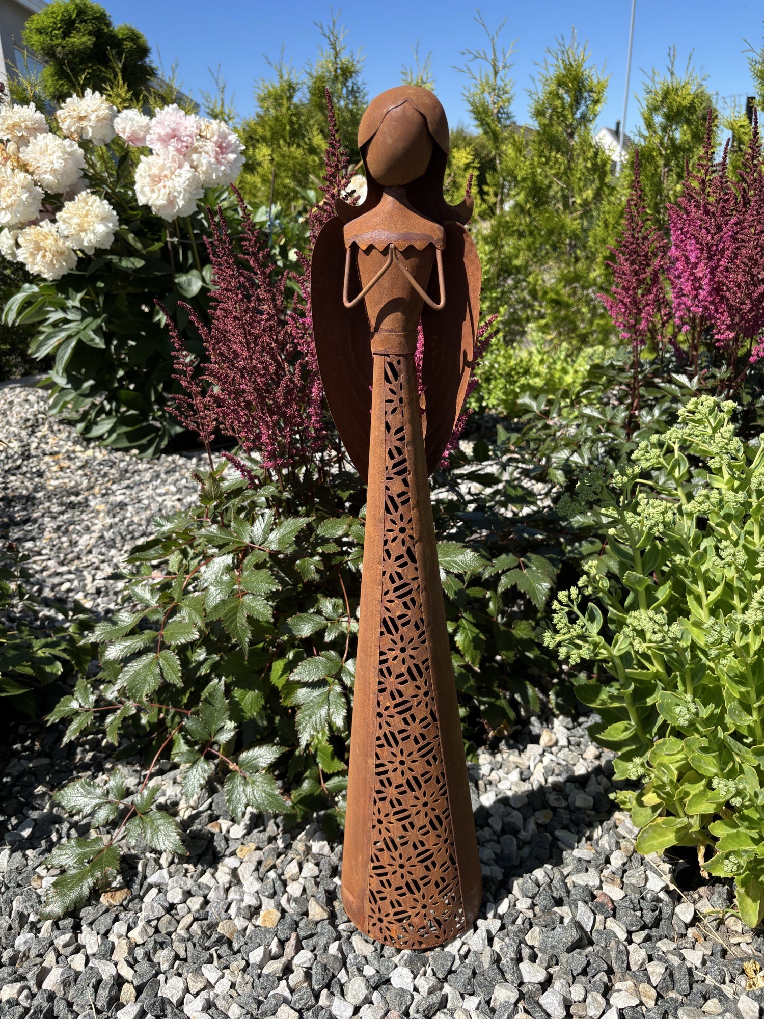 Stor rostig ängel marschallhållare