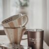 Majas Cottage mugg med text " Allt har sin tid en stund i taget"