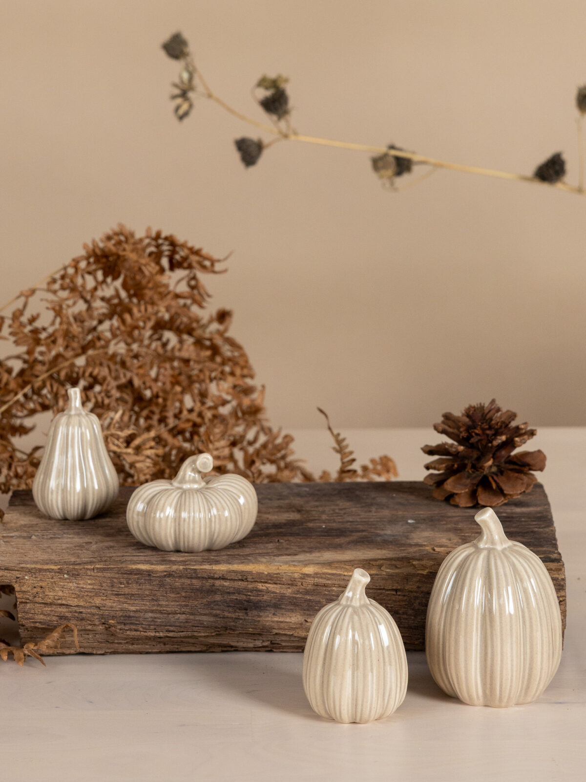 Pumpa i beige glaserad keramik